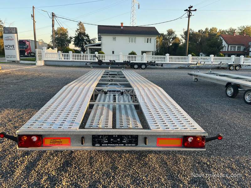 Niewiadow za transport dva vozila