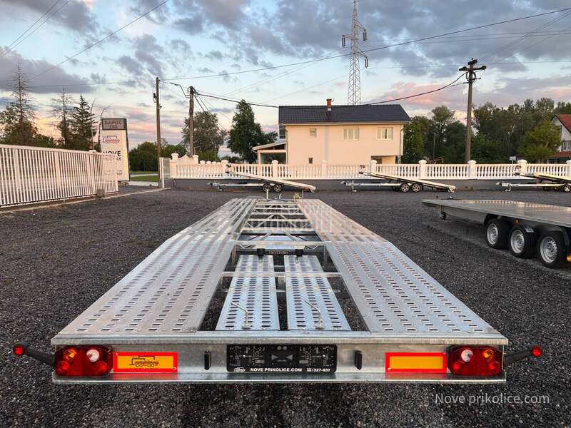 Niewiadow za transport dva vozila