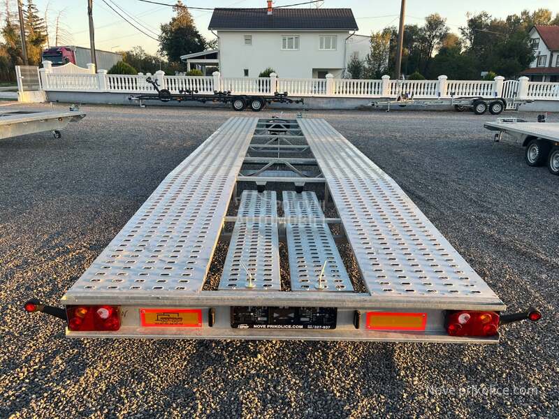 Niewiadow za transport dva vozila