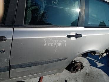 Zadnja leva vrata siva 647 za Fiat Stilo od 2001. do 2004. god.