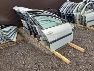 Leva vrata za Renault Clio, Espace, Kangoo ... od 2000. do 2006. god.