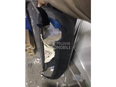 AMG branik sa difuzorom za Mercedes Benz E 200, E 220, E 230 ... od 2009. do 2012. god.