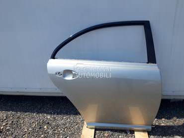 Zadnja Desna Vrata 1CO SIVA za Toyota Avensis od 2003. do 2009. god.