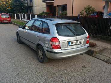 Mazda 323 -  kompletan auto u delovima