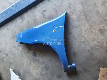 Levo krilo plavo iz originala za Fiat Punto od 2004. do 2010. god.