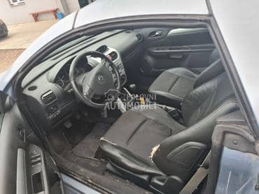 enterijer za Opel Tigra