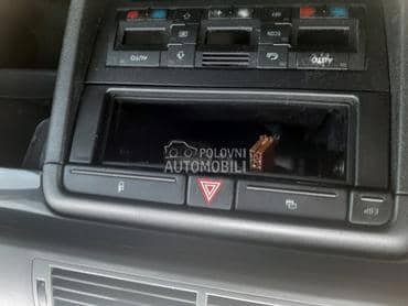prekidaci iznad radija za Audi A4
