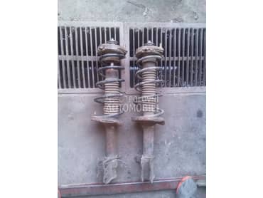 Amortizeri zadnji za Mazda 323 od 1998. do 2003. god.