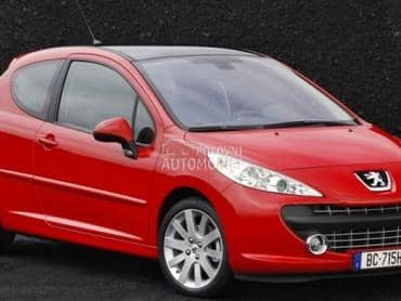 branik crveni sa niklovanim za Peugeot 207