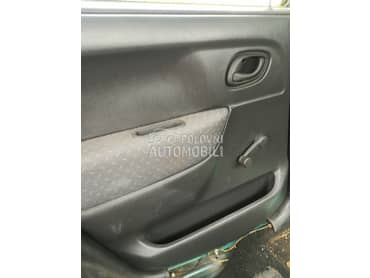 tapaciri vrata za Suzuki Wagon R+