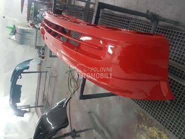 Prednji branik crvena Y547 za Opel Astra G od 1999. do 2009. god.