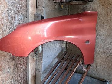 levo krilo narandzasto za Peugeot 206