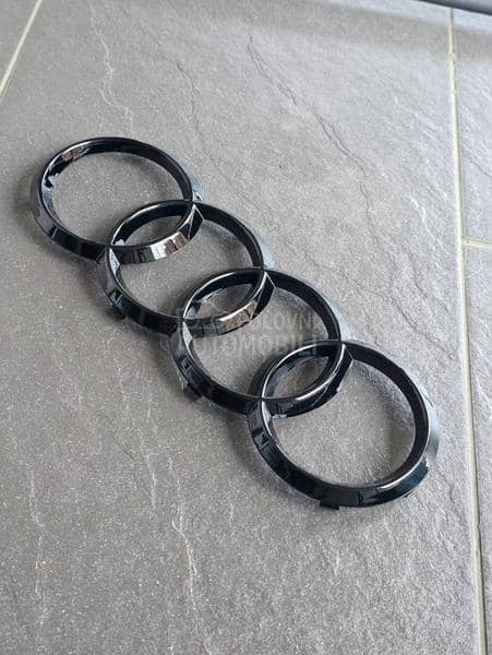 Sjaj crni prednji znak NOVO