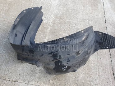 Prednje levo podkrilo koruba za Mazda 2 od 2002. do 2007. god.