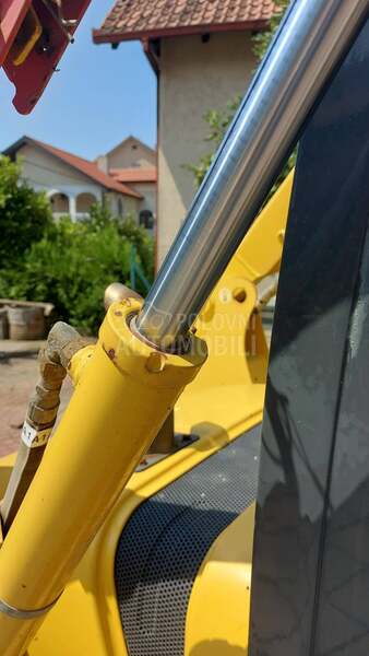 Komatsu SK714.5