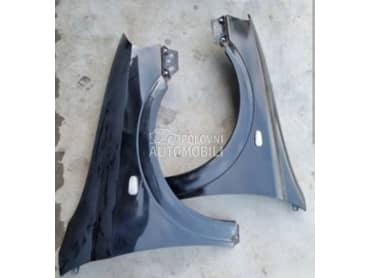 Krila vise boja za Opel Astra G