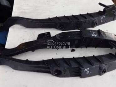 Nosaci branika ispod farova za Opel Astra J