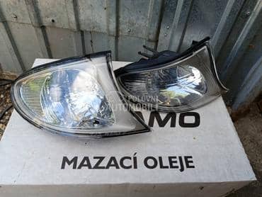 Migavac desni beli E46 za BMW 315, 316, 318 ... od 2002. do 2005. god.