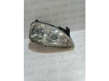 Desni far sa sacivima za Opel Corsa C