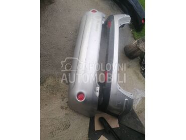 katadiopteri u zadnje braniku za Ford Fusion od 2003. do 2012. god.