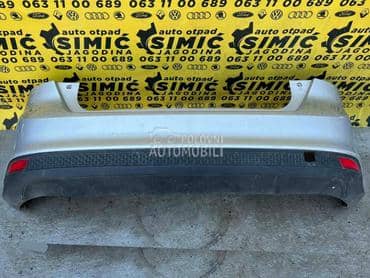 Branik zadnji sivi (hečbek) za Ford Focus od 2011. do 2014. god.