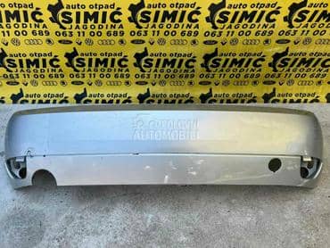 Branik zadnji sivi (hečbek) za Ford Focus od 1998. do 2001. god.