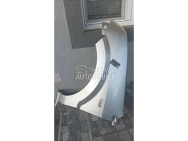 Levo krilo u sivoj boji za Ford Fusion od 2002. do 2010. god.