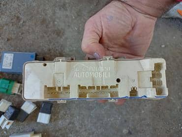 Kutija osigurača za Mazda 323 od 1999. do 2003. god.