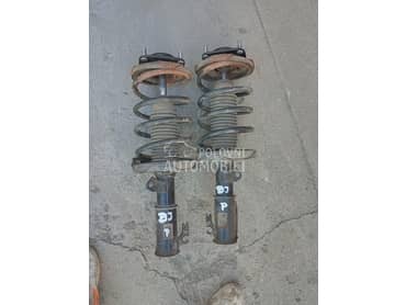 Amortizeri za Mazda 323 od 1999. do 2003. god.