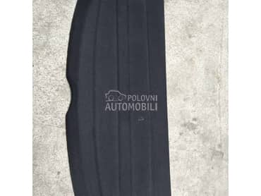 Polica u gepeku za Lancia Delta