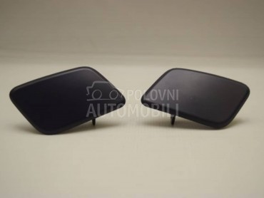 Poklopac prskalice levog fara za Fiat Doblo