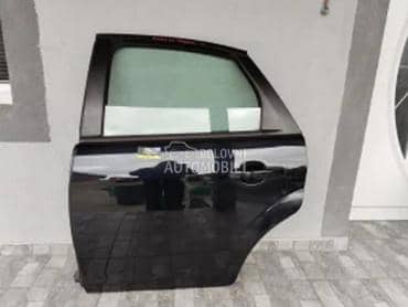 Zadnja leva vrata crna za Ford Focus od 2009. do 2010. god.