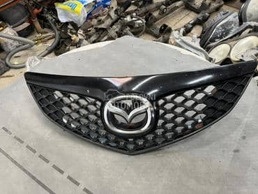 Maska ukrasna sa znakom za Mazda 3 od 2003. do 2006. god.