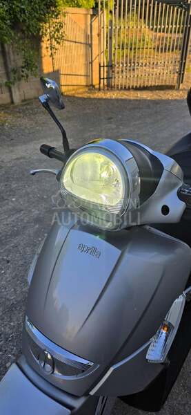 Aprilia Scarabeo kofer vel.vizir