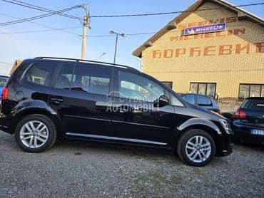 Volkswagen Touran 1.6 tdi 7 sed