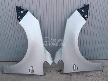 Krila svetlo siva za Opel Astra J od 2009. do 2016. god.