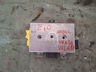 Centrala vrata levi modul E60, za BMW 518, 520, 520 GT ... od 2003. do 2010. god.