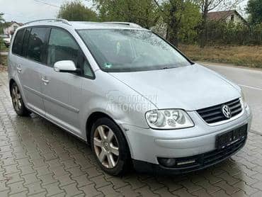Retrovizor desni za Volkswagen Touran od 2003. do 2015. god.