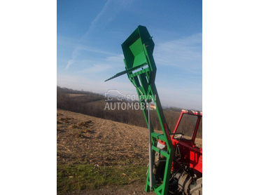 Traktorski utovarivač