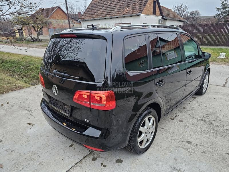 Volkswagen Touran 1,4tsi 7sedista