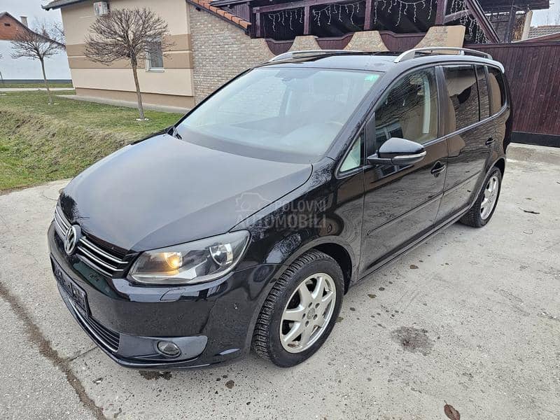 Volkswagen Touran 1,4tsi 7sedista