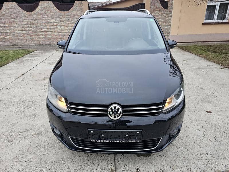 Volkswagen Touran 1,4tsi 7sedista