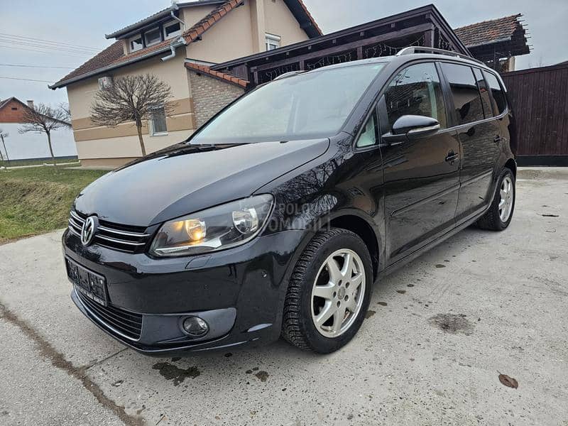 Volkswagen Touran 1,4tsi 7sedista