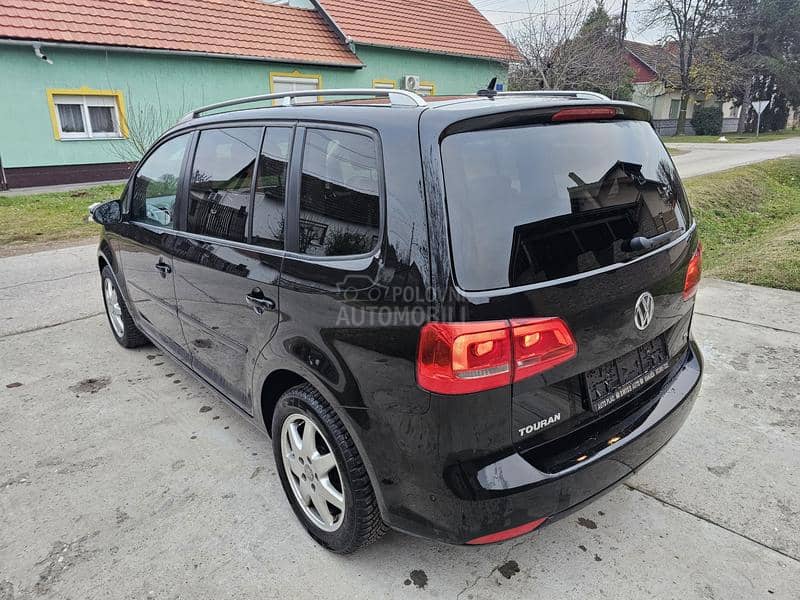 Volkswagen Touran 1,4tsi 7sedista