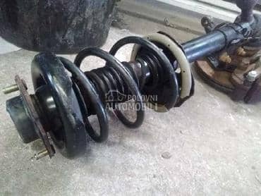 Amortizer sa oprugom za Nissan X-Trail od 2001. do 2013. god.
