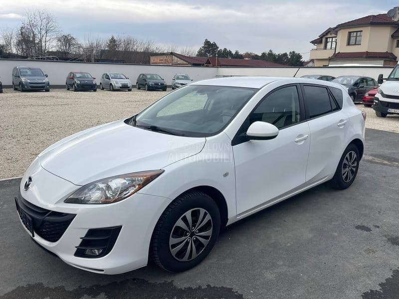 Mazda 3 1,6 d perla