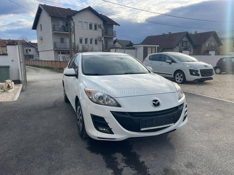 Mazda 3 1,6 d perla