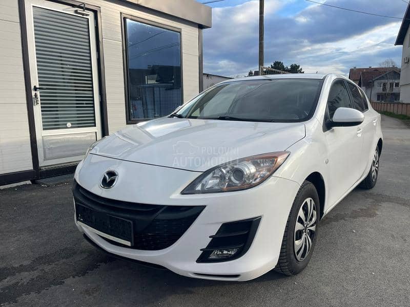 Mazda 3 1,6 d perla