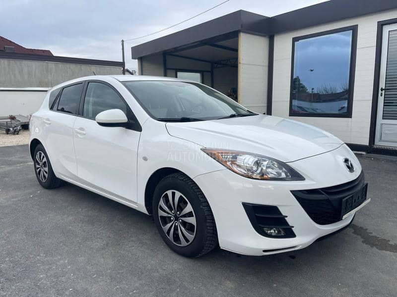 Mazda 3 1,6 d perla