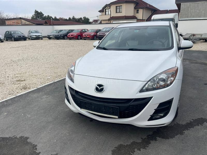 Mazda 3 1,6 d perla